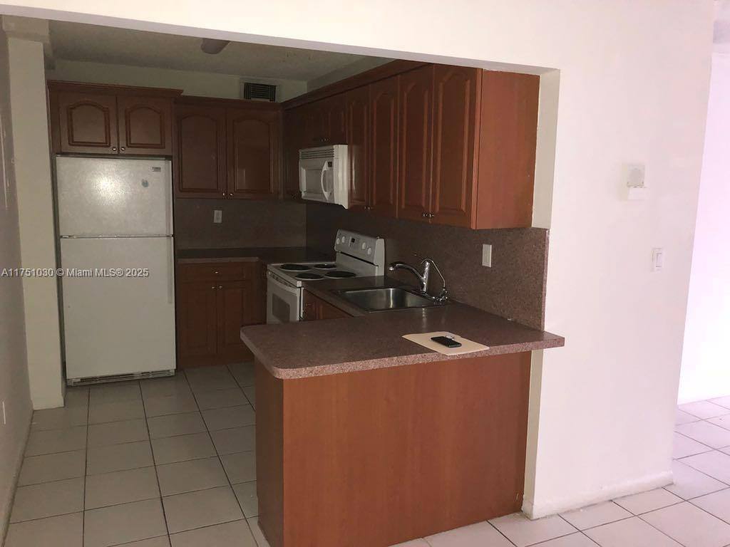 Apartment for rent at 16465 NE 22nd Ave #209, North Miami Beach, FL 33160