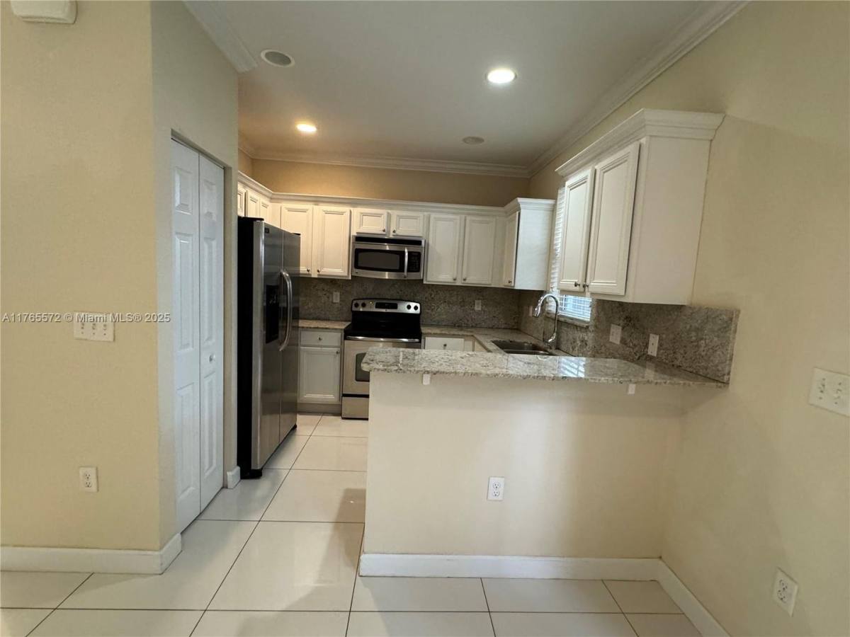 Townhouse for rent at 1035 NE 207th Terrace, Miami, FL 33179