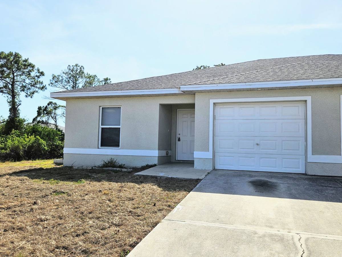 Townhouse for rent at 230 Hightower Ave S, Lehigh Acres, FL 33973