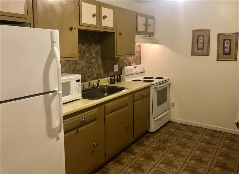 Townhouse for rent at 1462 Crittenden Rd, Rochester, NY 14623
