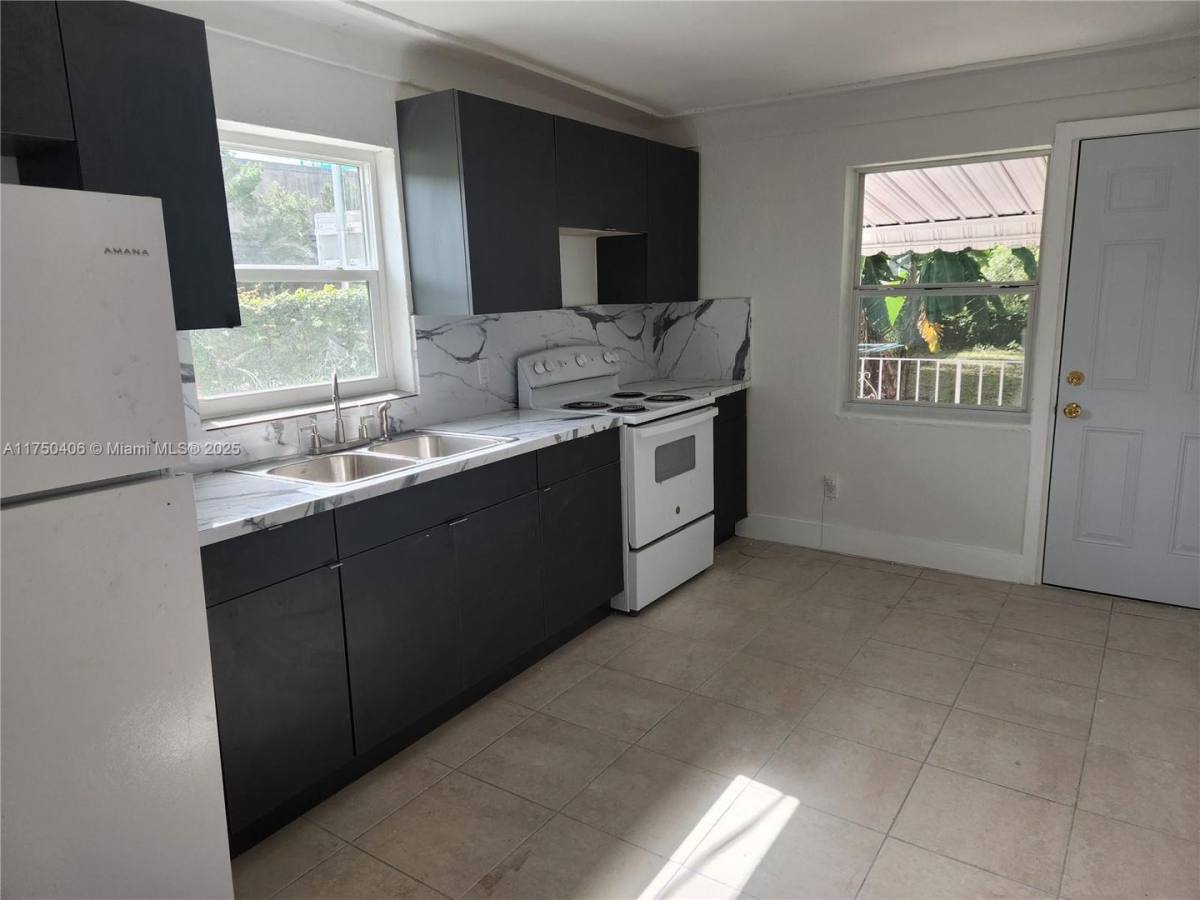 House for rent at 599 NW 94th St, Miami, FL 33150