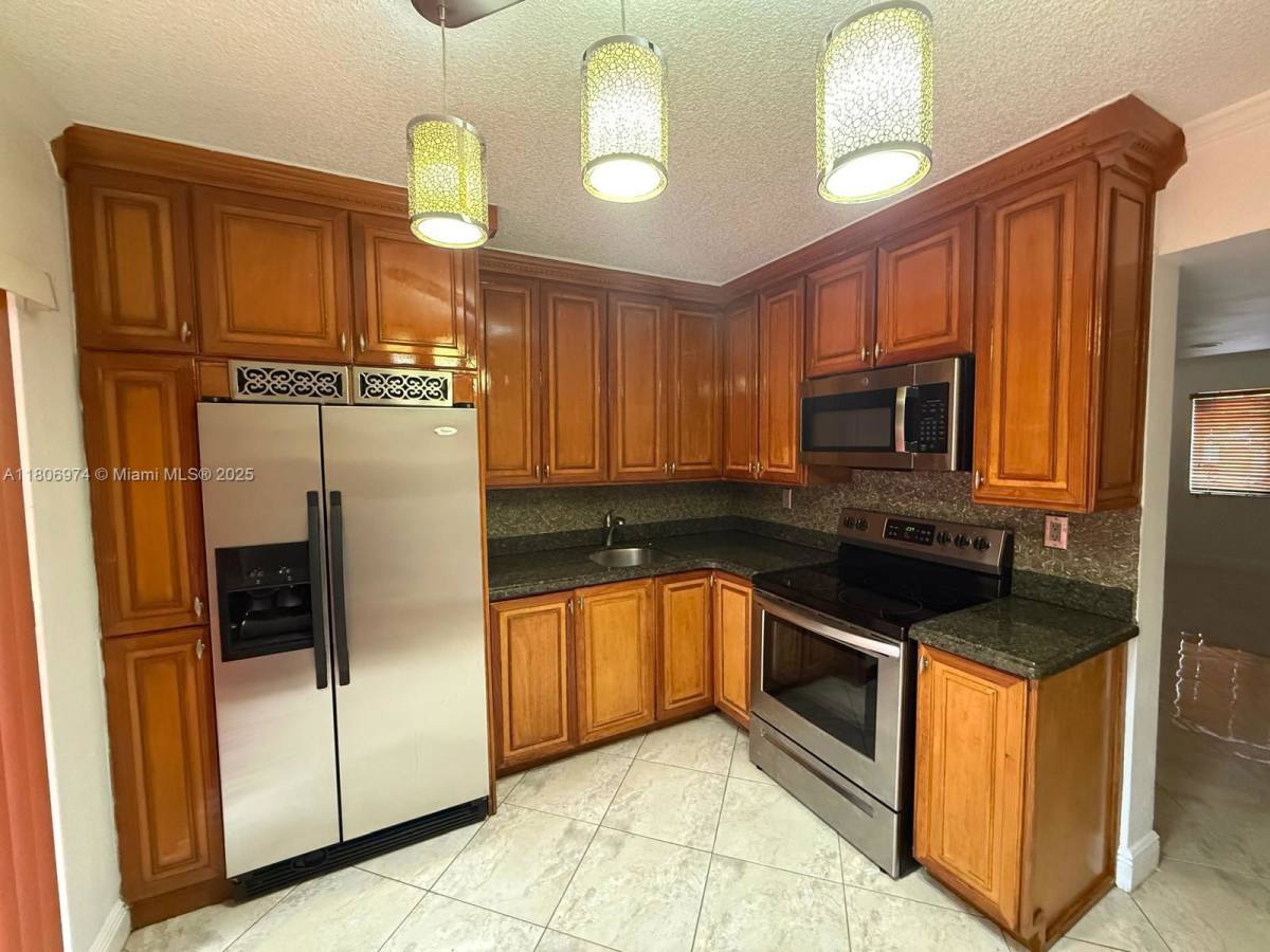 Townhouse for rent at 680 NW 82nd Place #260, Miami, FL 33126