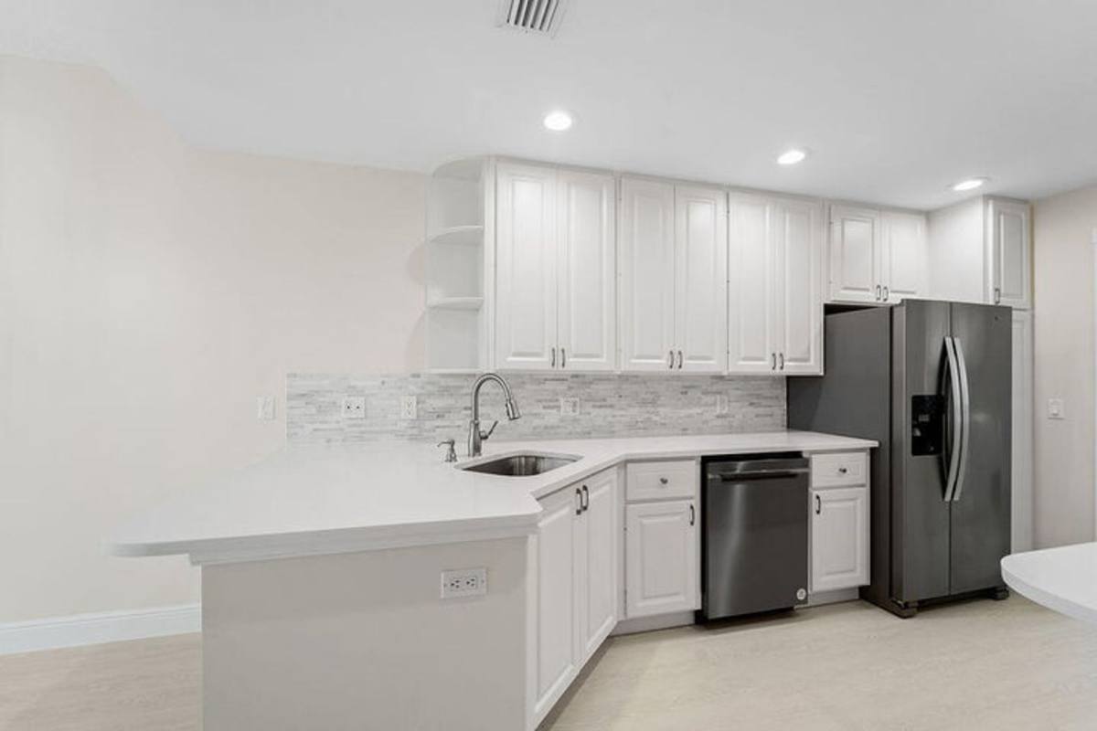 Townhouse for rent at 122 Ashley Court, Jupiter, FL 33458