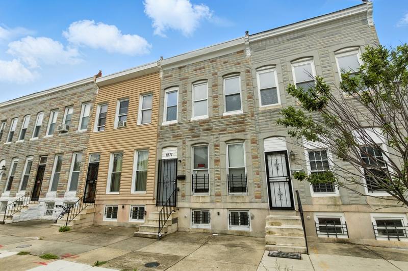 Townhouse for rent at 1211 E Oliver St, Baltimore, MD 21202