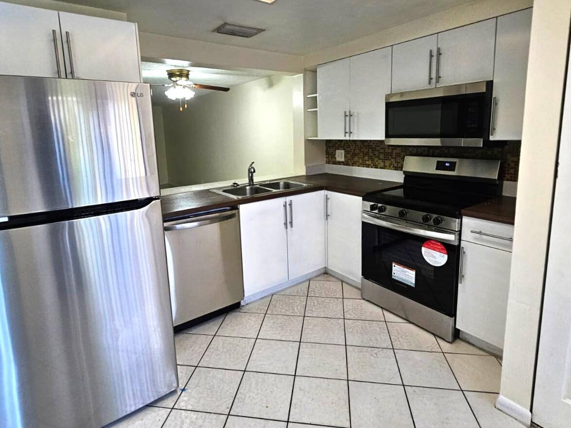 Condo for rent at Sunblest Townhomes, 8819 Springtree Lakes Dr #1, Fort Lauderdale, FL 33351