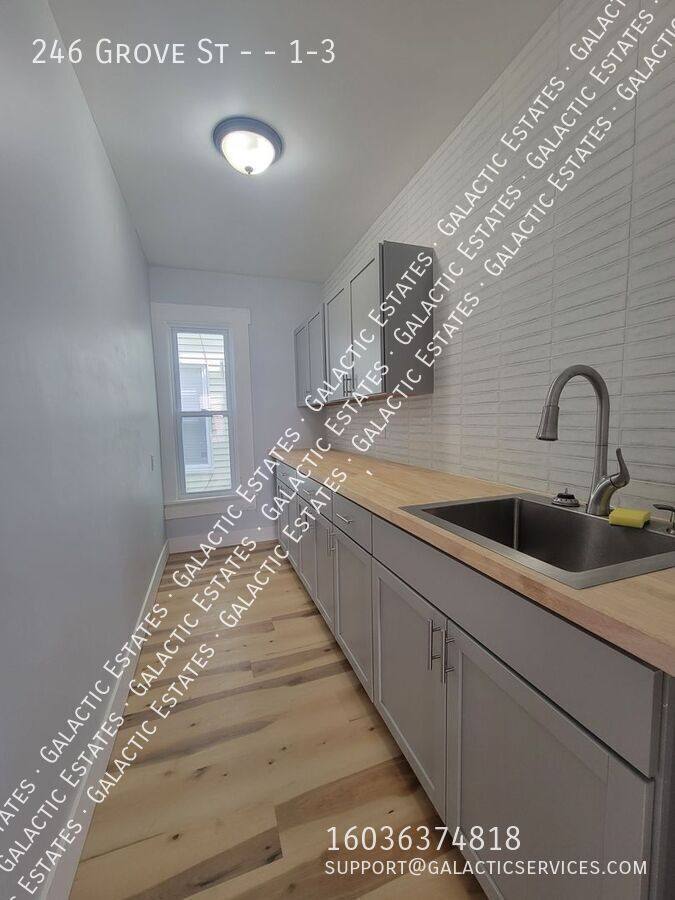 Apartment for rent at 246 Grove St #1-3, Manchester, NH 03103