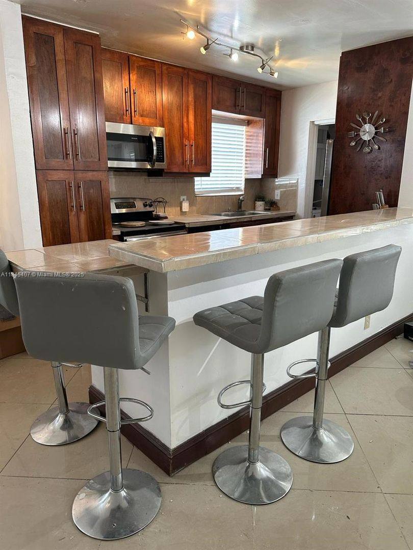 House for rent at 305 SW 7th St, Hallandale, FL 33009