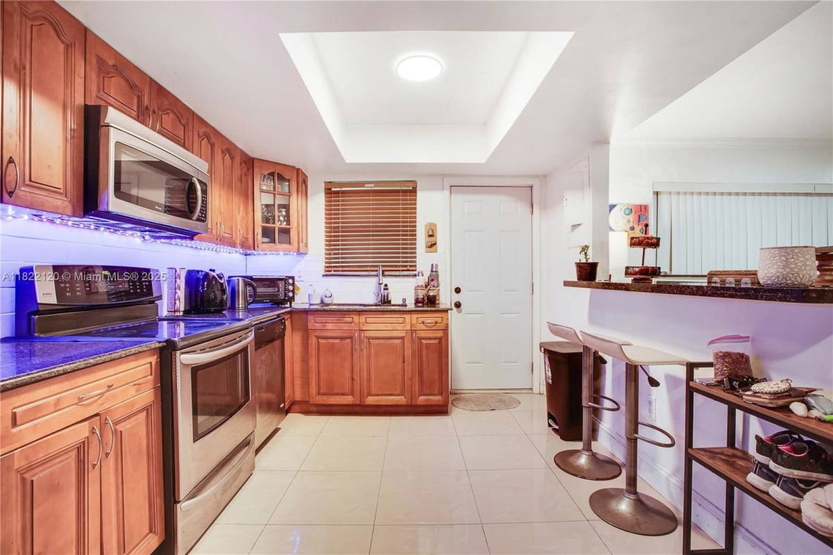 Condo for rent at 11930 NE 19th Dr #7, Miami, FL 33181