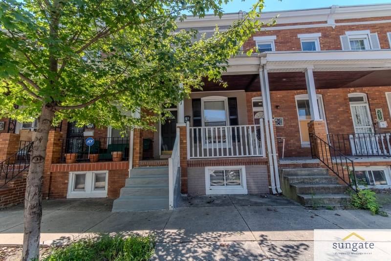 Townhouse for rent at 341 E 27th St, Baltimore, MD 21218