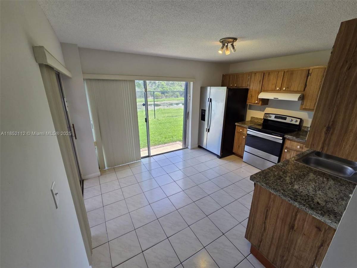House for rent at 9430 S Meadows Circle, Hollywood, FL 33025