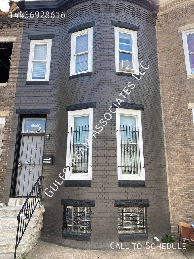 Townhouse for rent at 1706 N Carey St, Baltimore, MD 21217