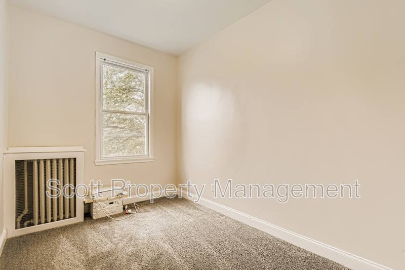 Townhouse for rent at 824 E 33rd St, Baltimore, MD 21218