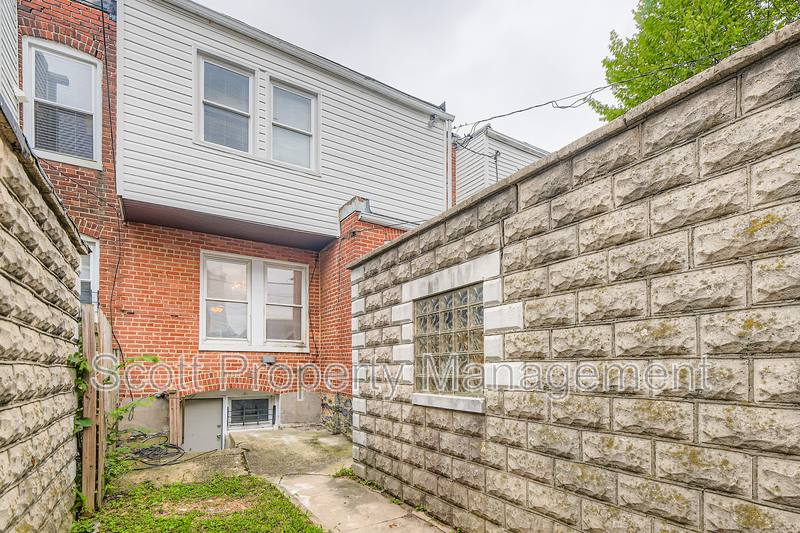 Townhouse for rent at 824 E 33rd St, Baltimore, MD 21218