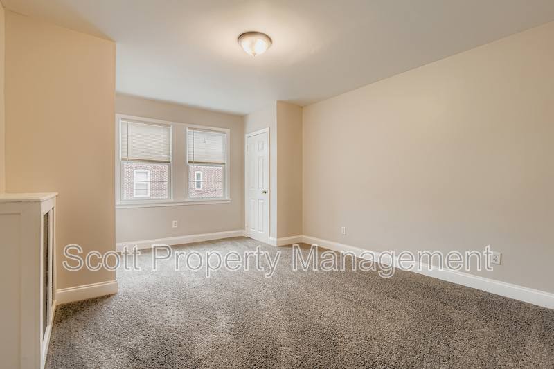 Townhouse for rent at 824 E 33rd St, Baltimore, MD 21218