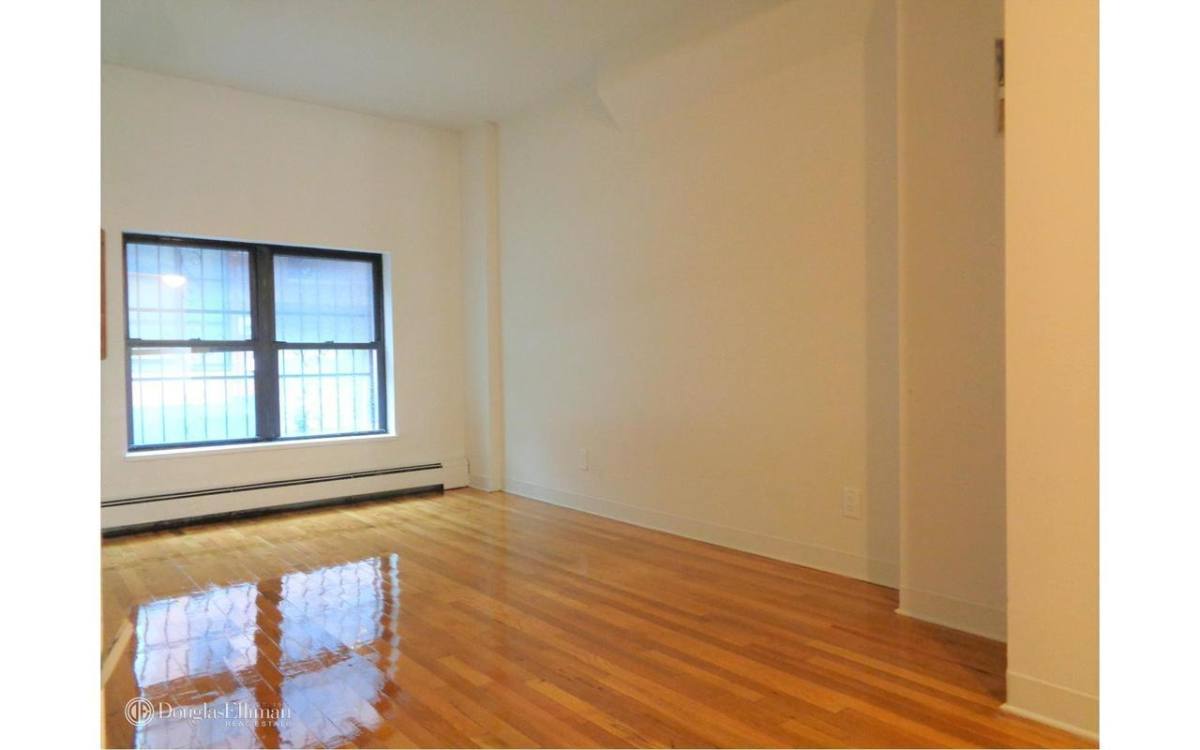 Apartment for rent at 523 W 49th St #1B, New York, NY 10019