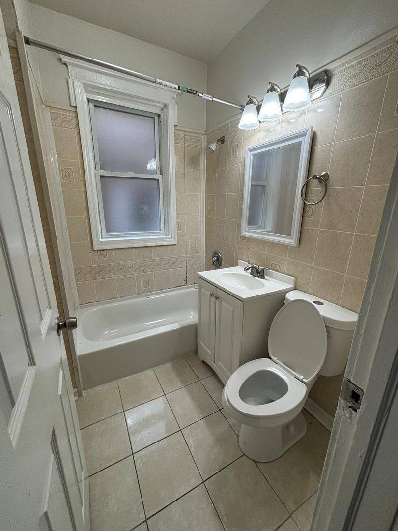House for rent at 1446 E 69th Place, Chicago, IL 60619