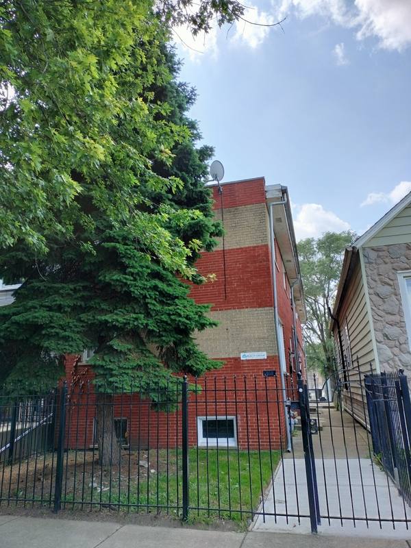 Townhouse for rent at 7910 S Muskegon Ave #1, Chicago, IL 60617