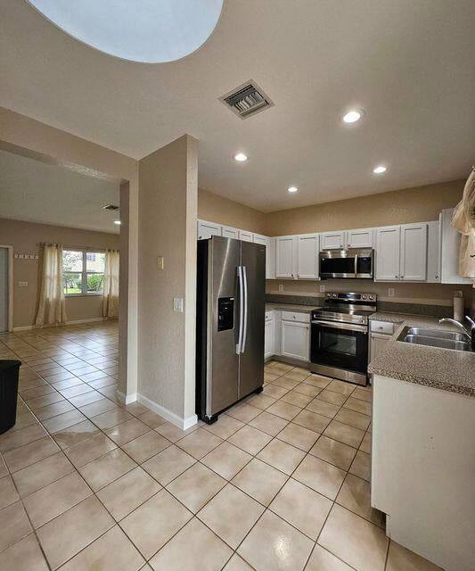 Townhouse for rent at 13490 Old Englishtown Rd, Wellington, FL 33414