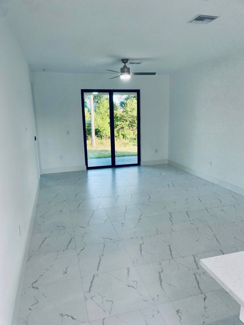Townhouse for rent at 2425 Millie Ave S, Lehigh Acres, FL 33973