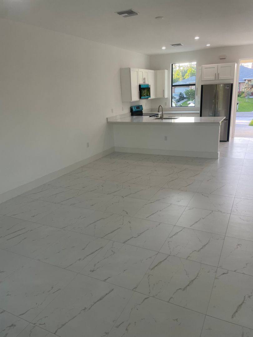 Townhouse for rent at 2425 Millie Ave S, Lehigh Acres, FL 33973