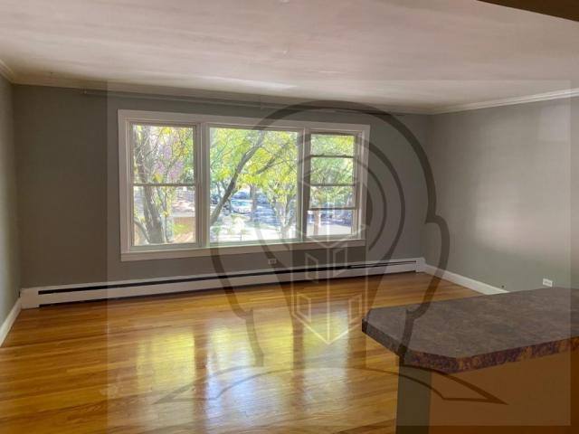 Condo for rent at 5601 W Goodman St #3, Chicago, IL 60630