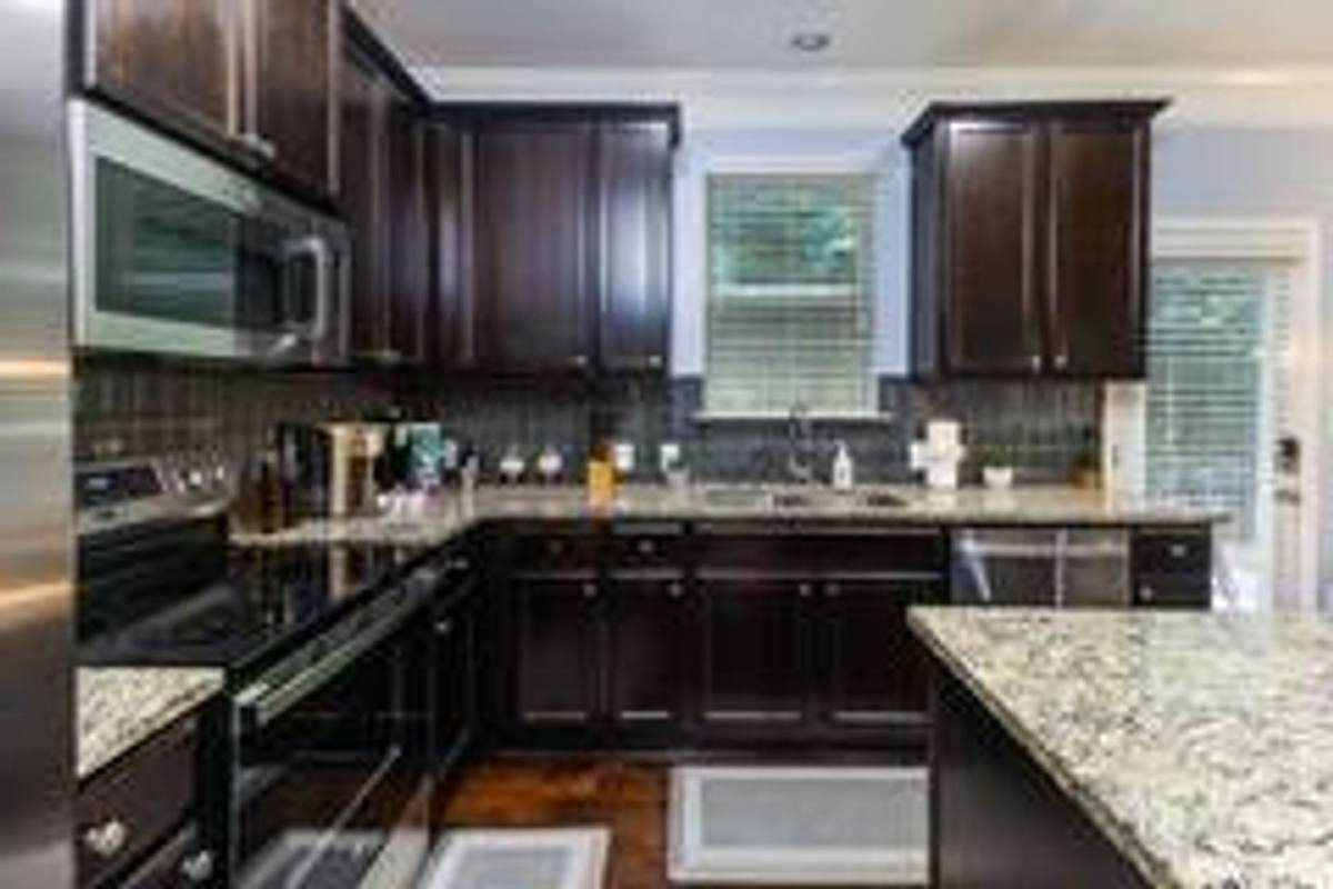 Townhouse for rent at 1547 Paxton Dr SW, Lilburn, GA 30047