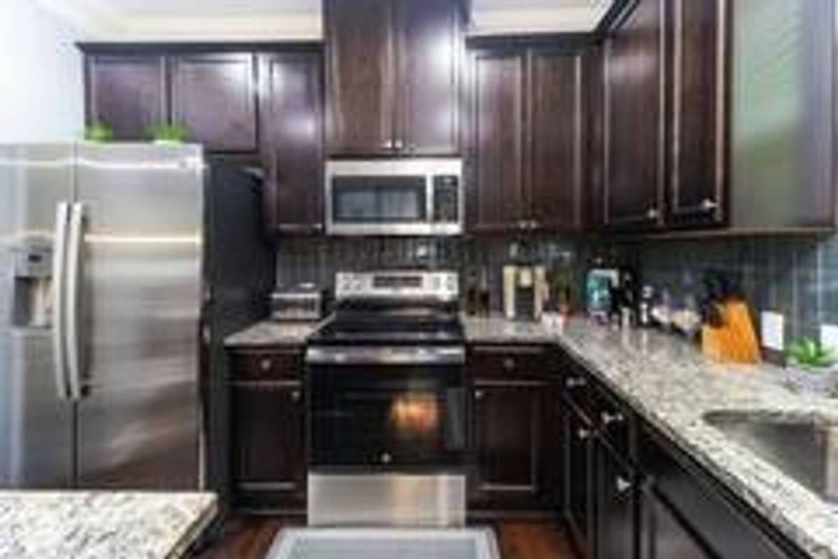 Townhouse for rent at 1547 Paxton Dr SW, Lilburn, GA 30047