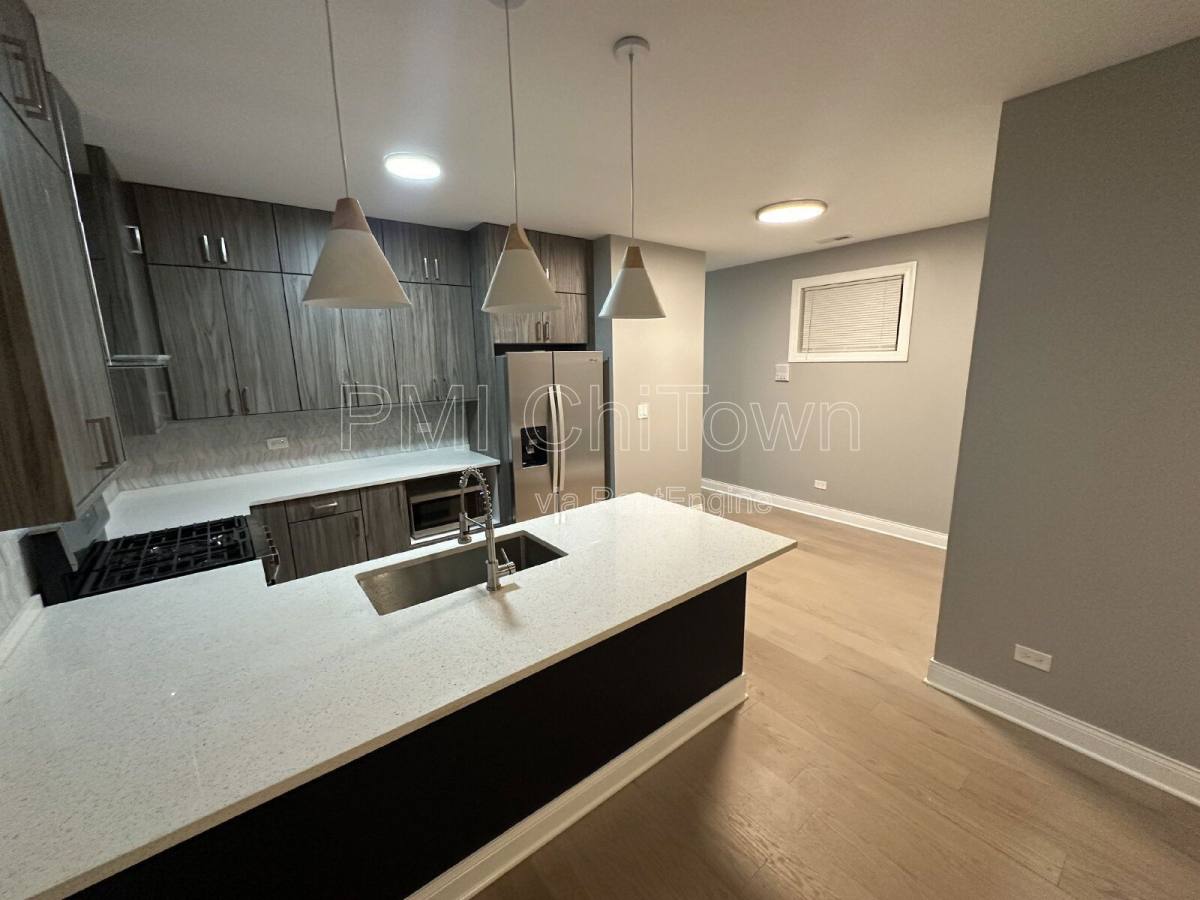 Condo for rent at 4950 S Michigan Ave #1, Chicago, IL 60615