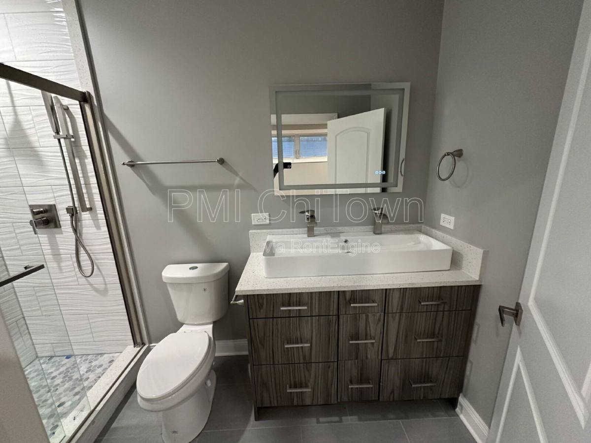 Condo for rent at 4950 S Michigan Ave #1, Chicago, IL 60615