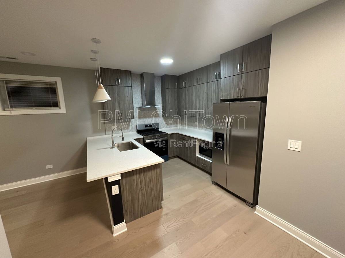 Condo for rent at 4950 S Michigan Ave #1, Chicago, IL 60615