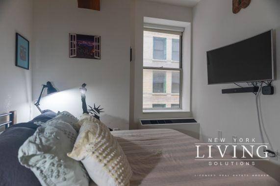 Apartment for rent at 67 Wall St #6K, New York, NY 10005