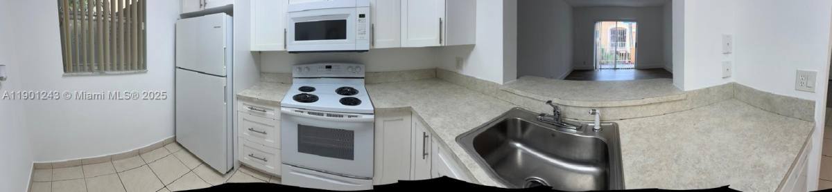 Condo for rent at 18101 NW 68th Ave #18101E210, Hialeah, FL 33015