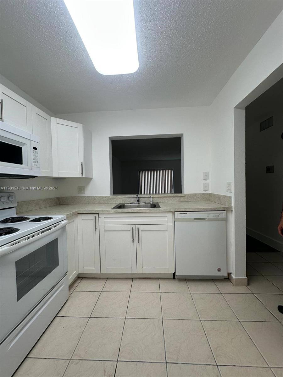 Condo for rent at 18101 NW 68th Ave #18101E210, Hialeah, FL 33015