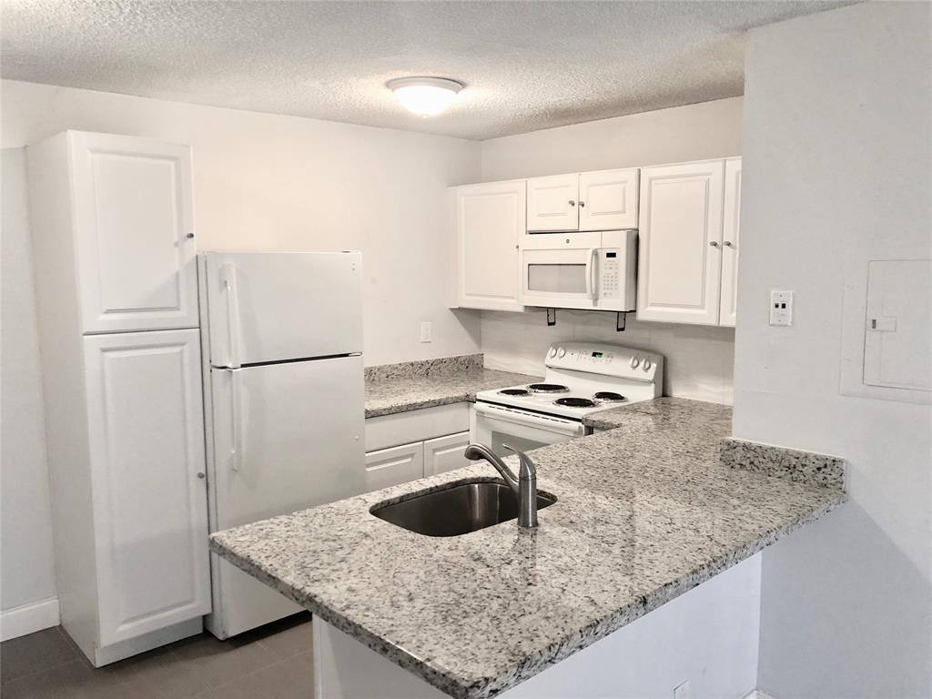 Condo for rent at 651 Lyons Rd #10104, Pompano Beach, FL 33063