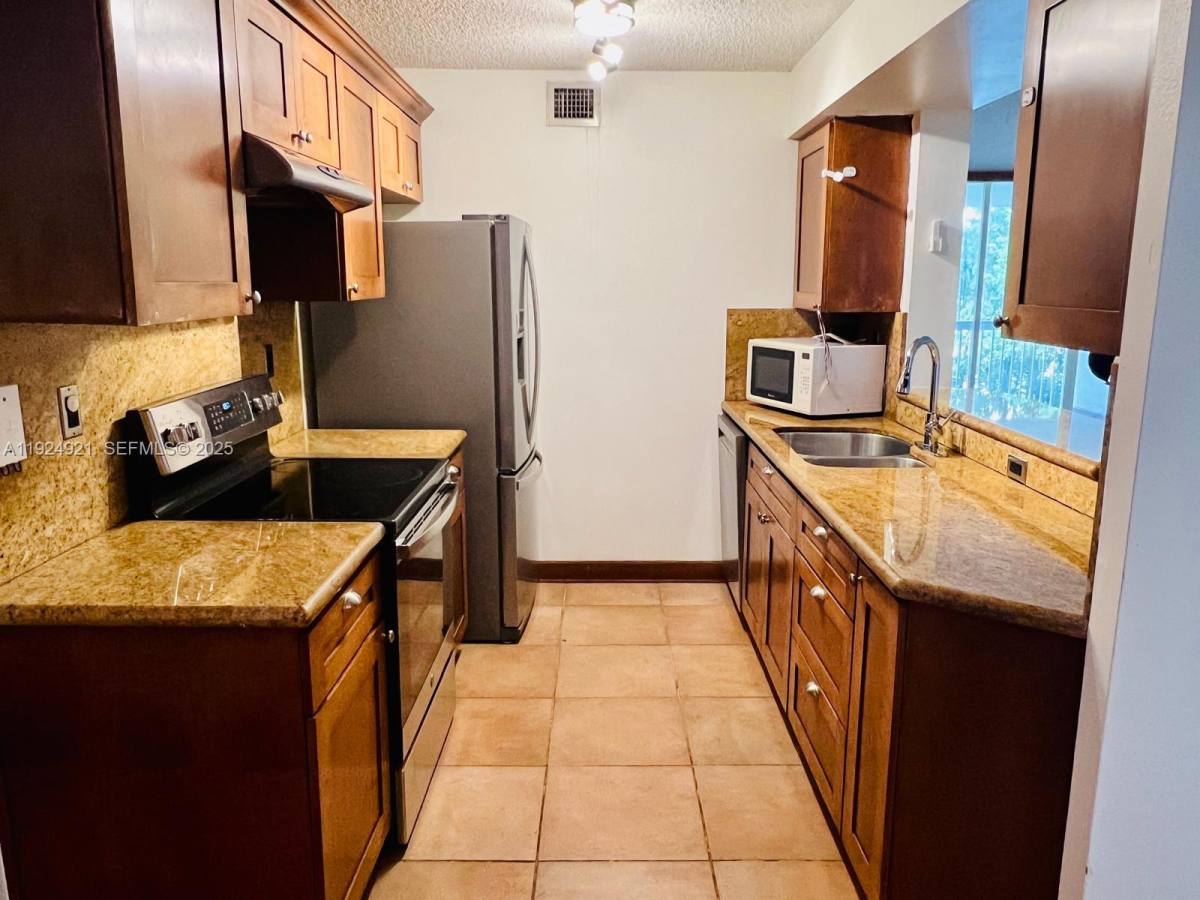 Condo for rent at 4990 NW 97th Place #314, Miami, FL 33178
