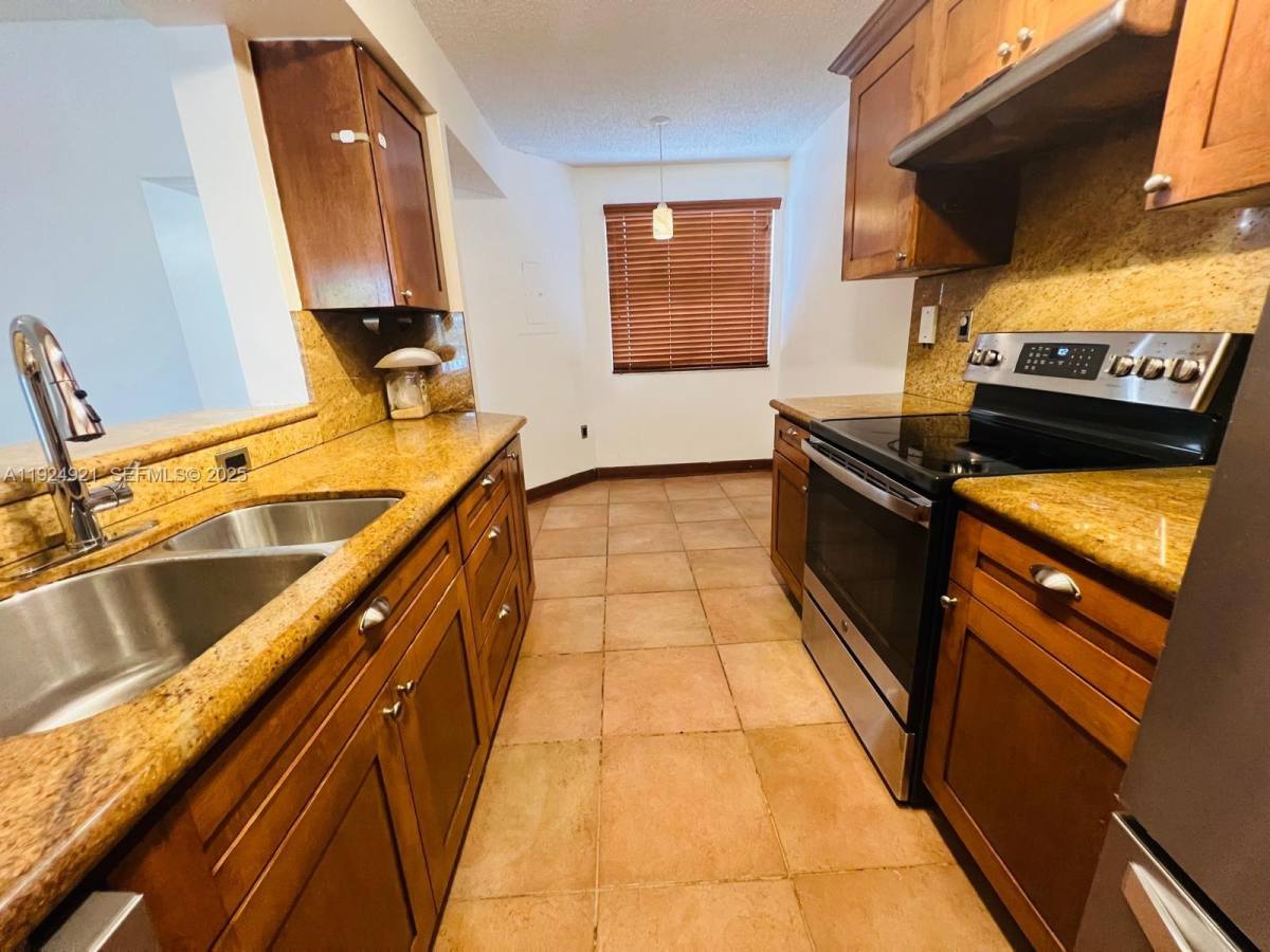 Condo for rent at 4990 NW 97th Place #314, Miami, FL 33178