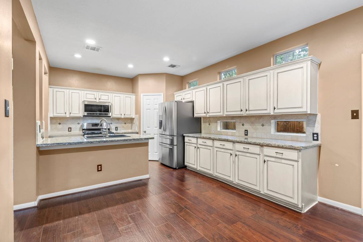 Townhouse for rent at 70 Harvest Wind Place #70, Spring, TX 77382