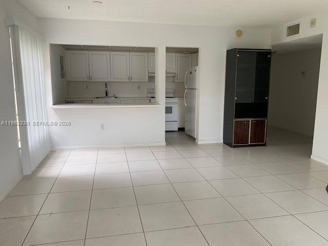 Condo for rent at 17650 NW 68th Ave #17650A1005, Hialeah, FL 33015