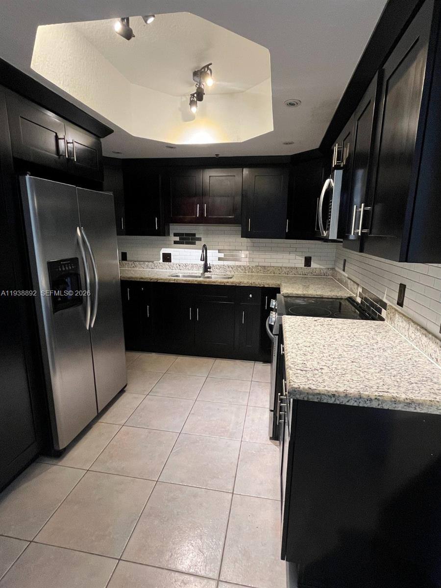 Apartment for rent at 17455 NW 75th Place #104, Hialeah, FL 33015