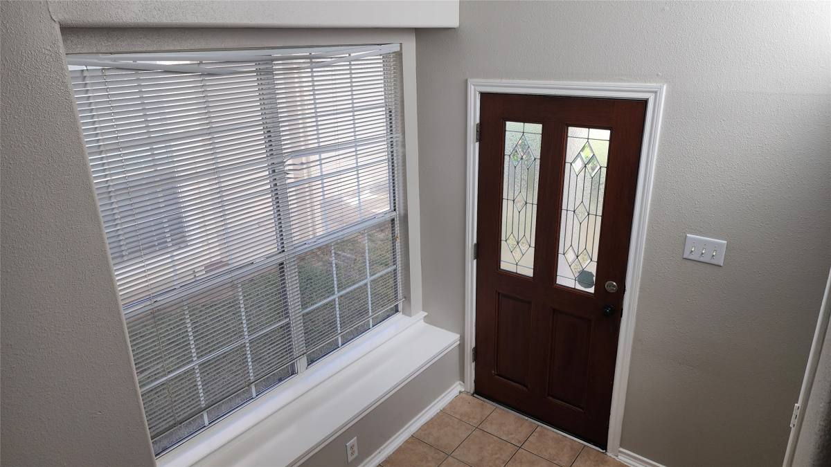 Townhouse for rent at 11430 Hackmatack Way, Houston, TX 77066