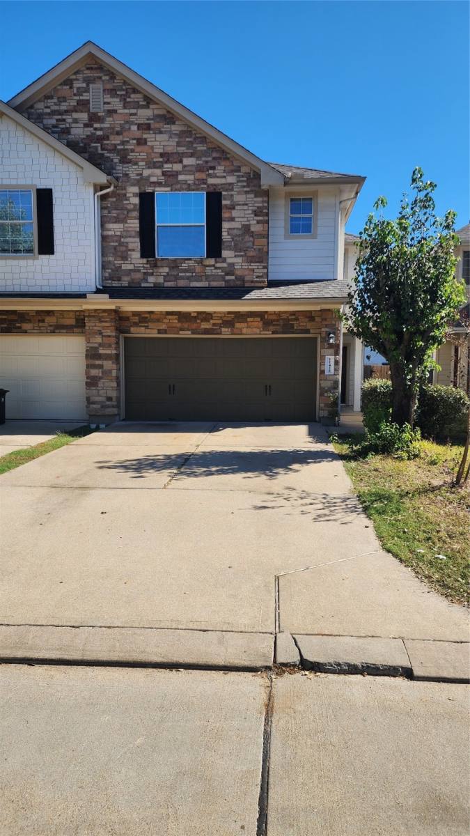 Townhouse for rent at 11430 Hackmatack Way, Houston, TX 77066