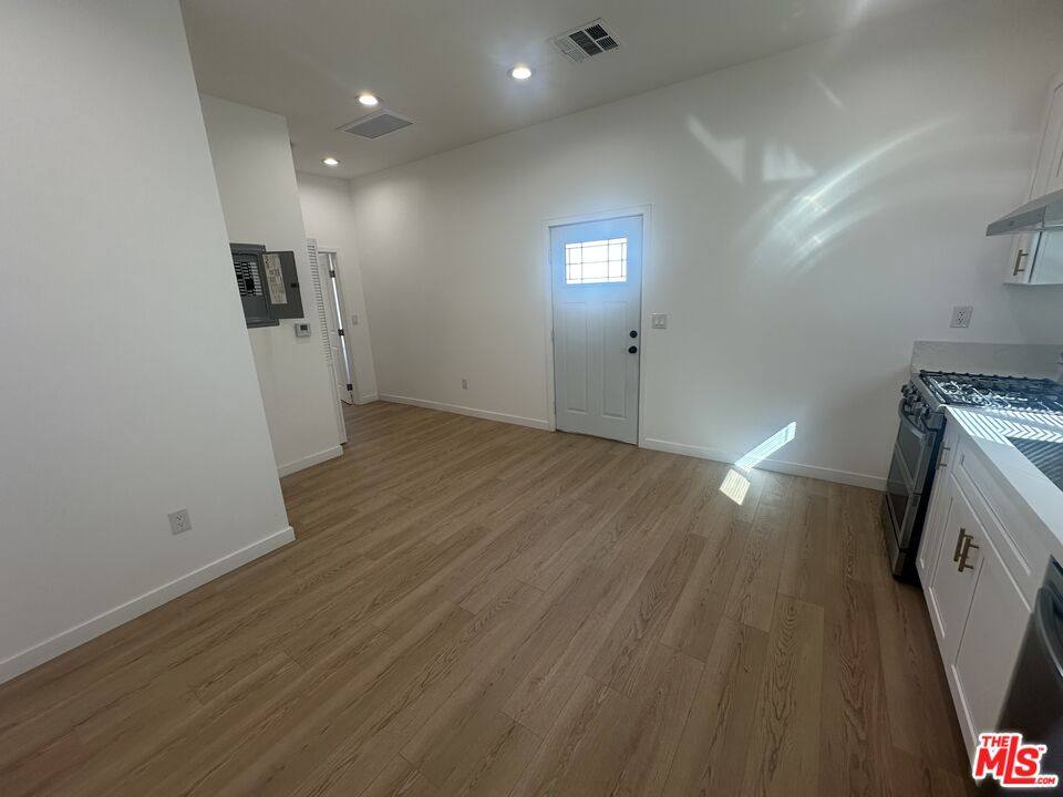 Apartment for rent at 1174 S Windsor Blvd, Los Angeles, CA 90019