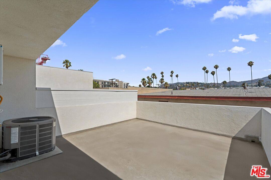 Townhouse for rent at 1409 N Hobart Blvd #104, Los Angeles, CA 90027