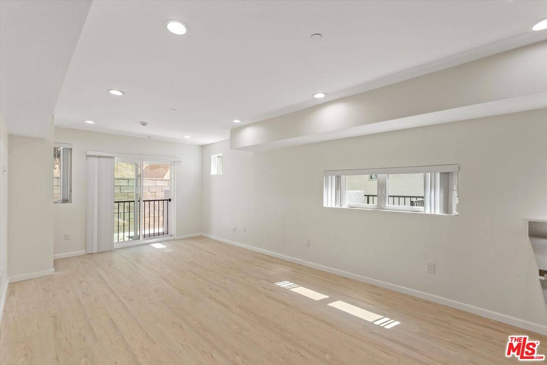 Townhouse for rent at 1409 N Hobart Blvd #104, Los Angeles, CA 90027