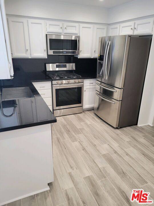 Townhouse for rent at 1250 S Corning St #2, Los Angeles, CA 90035