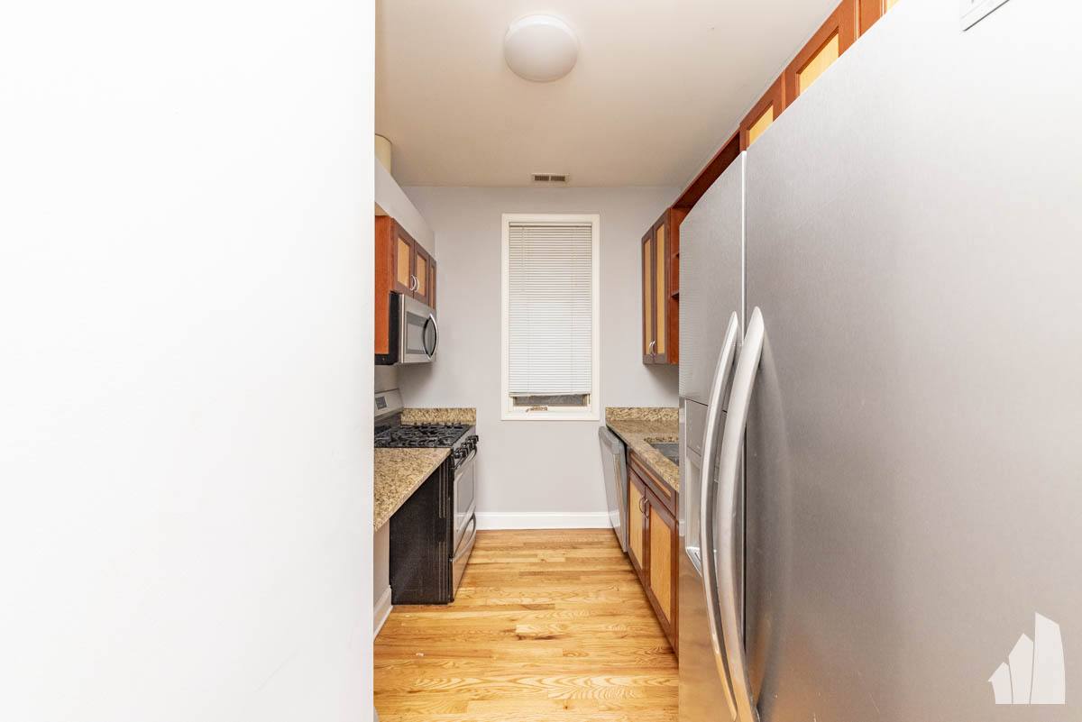 Condo for rent at 1133 W Addison #1, Chicago, IL 60613