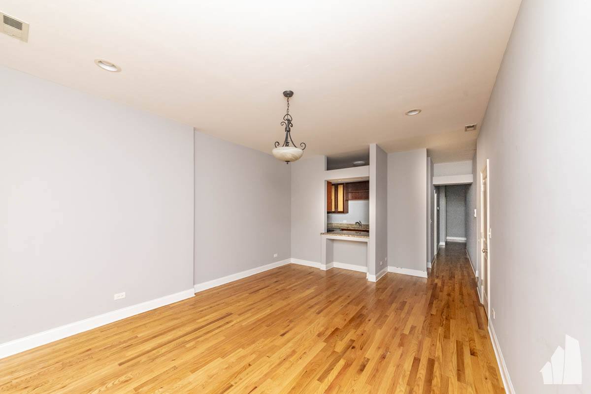 Condo for rent at 1133 W Addison #1, Chicago, IL 60613