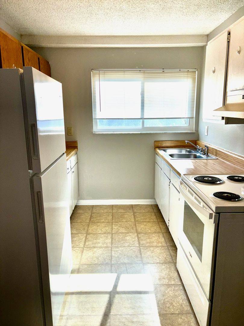 Townhouse for rent at 1519 Crums Lane, Louisville, KY 40216