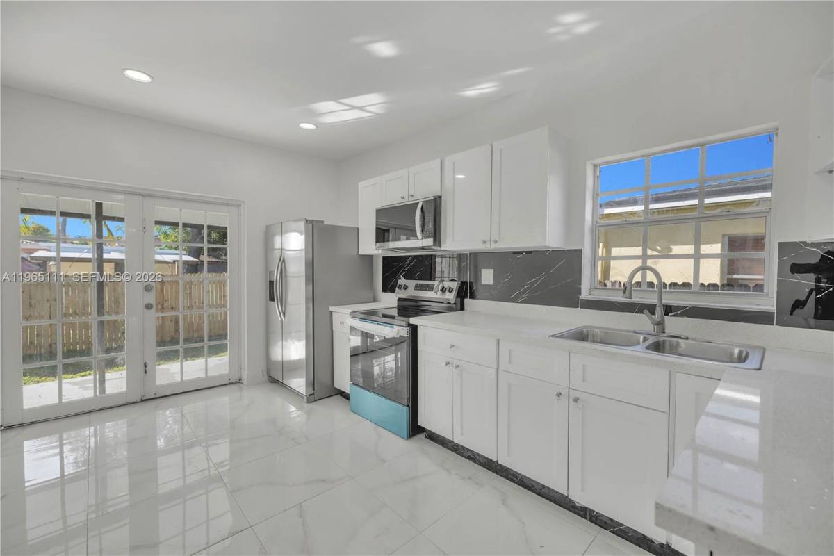 536 NW 25th Ave #A, Miami, FL 33125 - House For Rent - Image 1