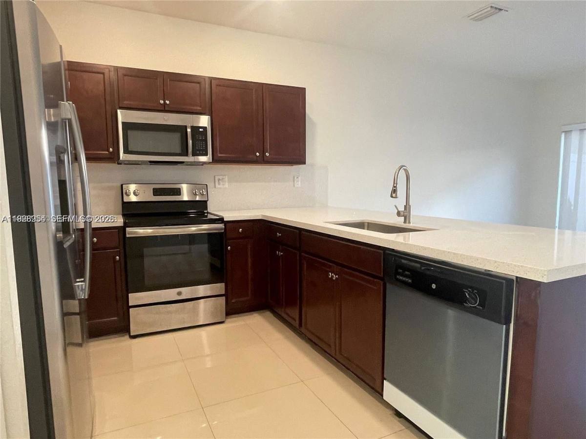 Townhouse for rent at 10491 W 34th Court, Hialeah, FL 33018